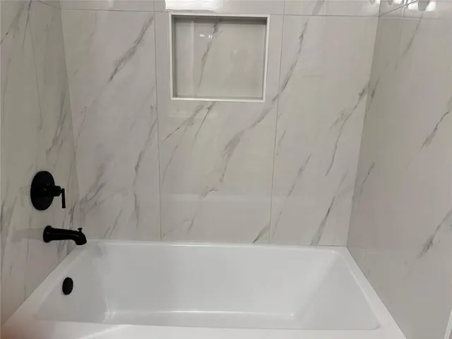 a bathroom with a bathtub