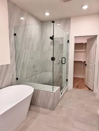 a bathroom with double sink and a mirror