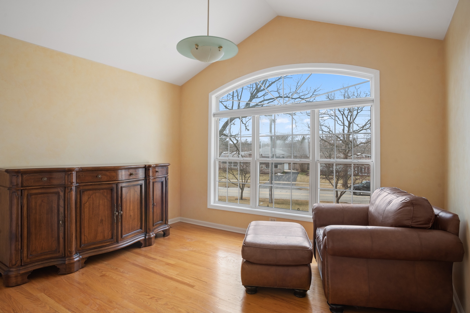 981 Ridge Road Highland Park, IL 60035 - Photo 13 of 15 a living room with furniture a window and a chandelier