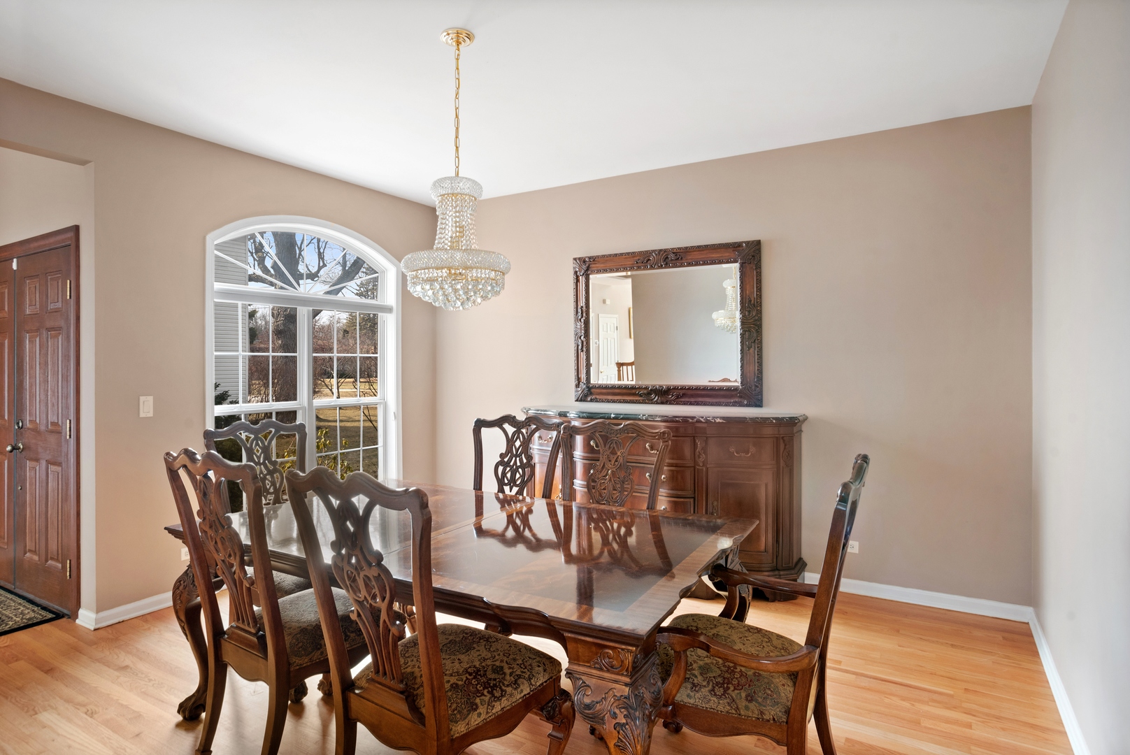 981 Ridge Road Highland Park, IL 60035 - Photo 6 of 15 a view of a dining room with furniture window and wooden floor