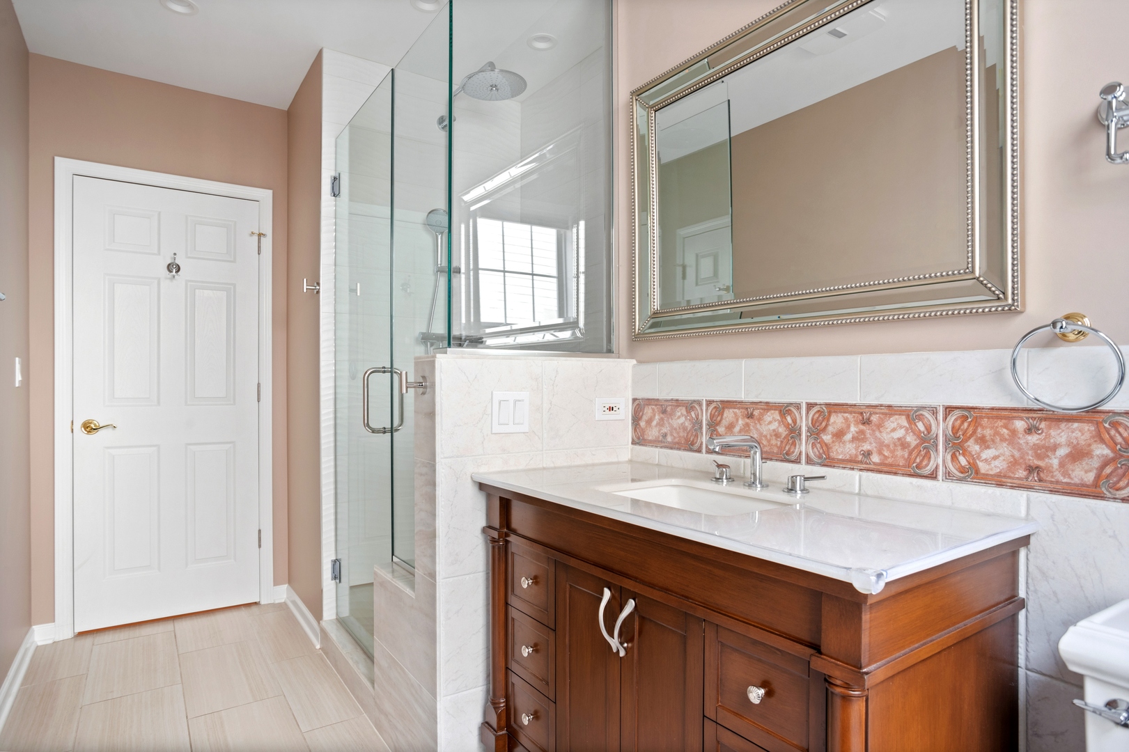 981 Ridge Road Highland Park, IL 60035 - Photo 8 of 15 a bathroom with a sink and a mirror