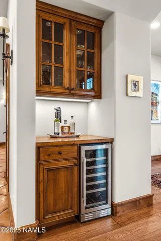 a bedroom with a bed and a fireplace