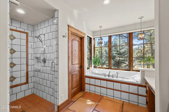 a living room with furniture rug and window