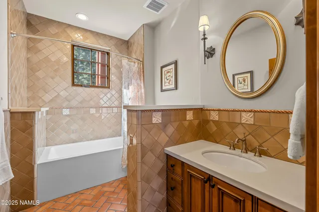 a work room with furniture and a window