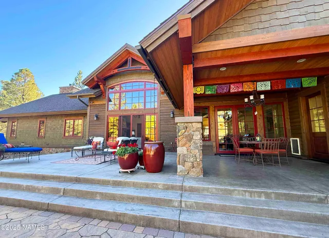 a view of a chairs and tables in the patio
