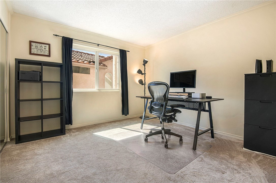 12065 Crystal Glen Way Porter Ranch, CA 91326 - Photo 25 of 38 a view of a workspace with furniture and a window