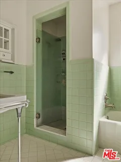 a bathroom with a sink and a shower