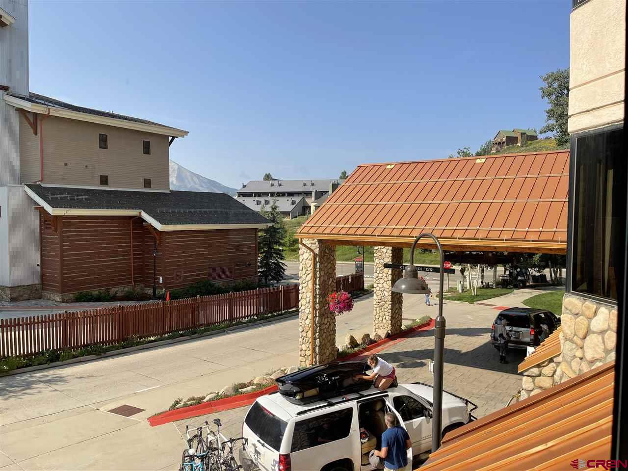 6 Emmons Road, Unit 269 Crested Butte, CO 81225 - Photo 12 of 18 a patio with table and chairs