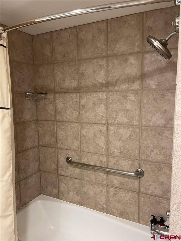 6 Emmons Road, Unit 269 Crested Butte, CO 81225 - Photo 8 of 18 a bathroom with a shower