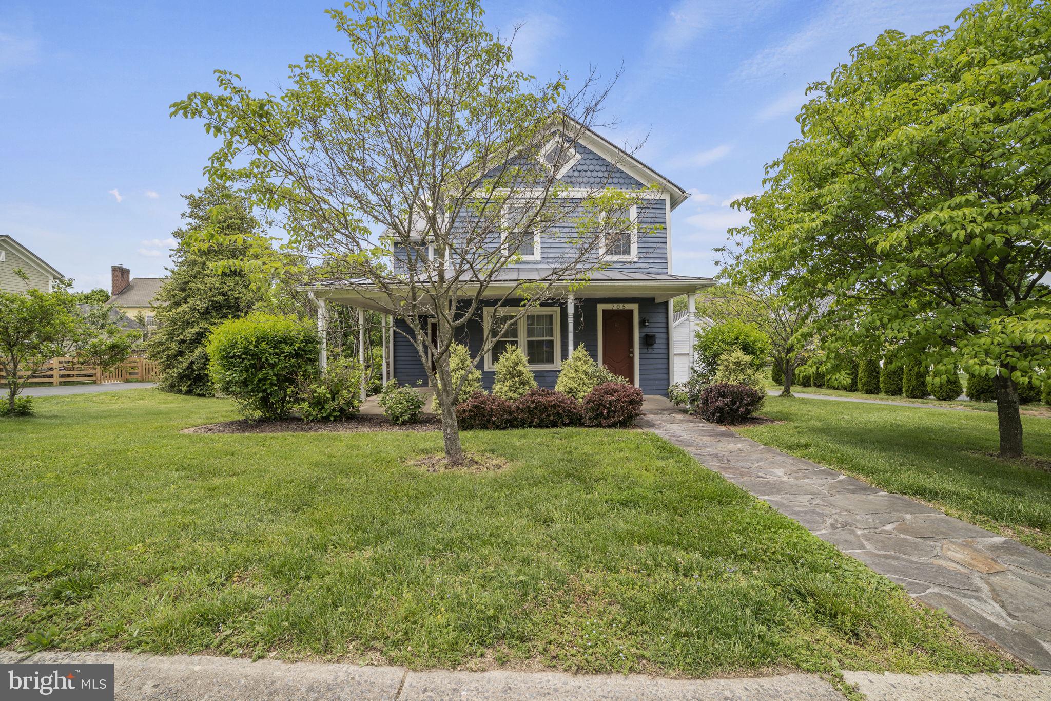 705 Dranesville Road Herndon, VA 20170 - Photo 3 of 22 Charming home with lush greenery.