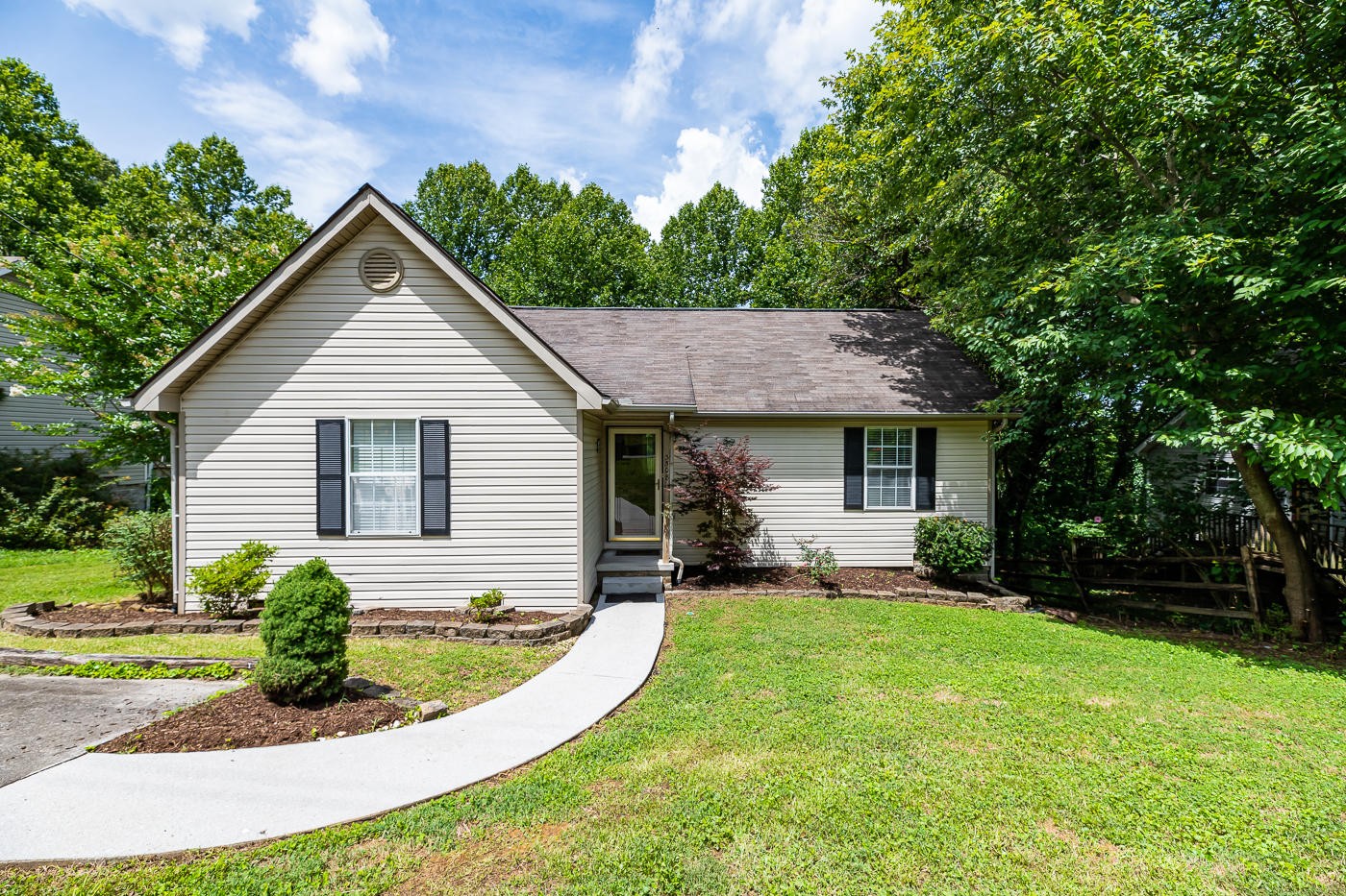 3508 Wexgate Road Knoxville, TN 37931 - Photo 1 of 17 a view of a house with a yard patio and a garden