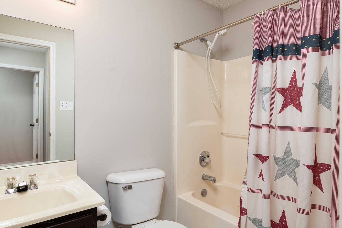 3508 Wexgate Road Knoxville, TN 37931 - Photo 14 of 17 a bathroom with a sink toilet and shower