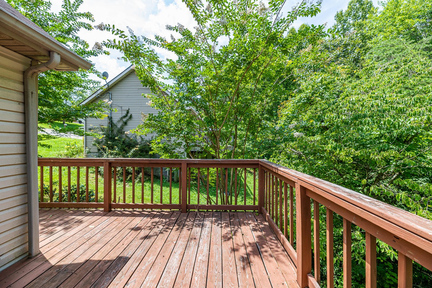 3508 Wexgate Road Knoxville, TN 37931 - Photo 16 of 17 a balcony with wooden floor and yard in the back