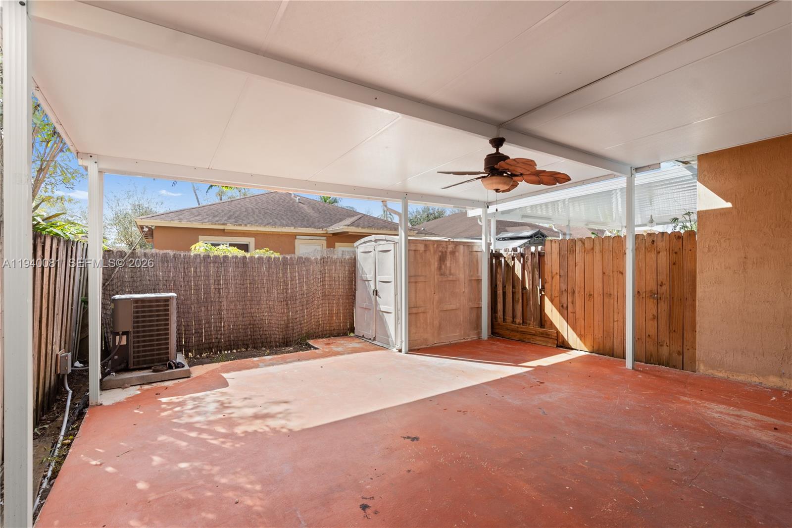 1564 Southwest 2nd Street Homestead, FL 33030 - Photo 27 of 29 a view of a room with wooden walls