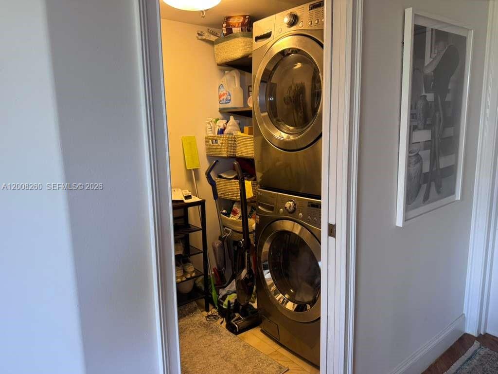 2400 Southwest 3rd Avenue, Unit 601 Miami, FL 33129 - Photo 18 of 21 a view of storage and utility room with washer and dryer