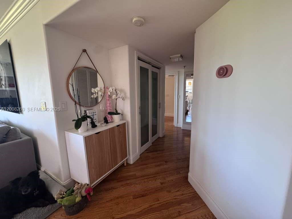 2400 Southwest 3rd Avenue, Unit 601 Miami, FL 33129 - Photo 5 of 21 a view of a hallway with wooden floor and entryway