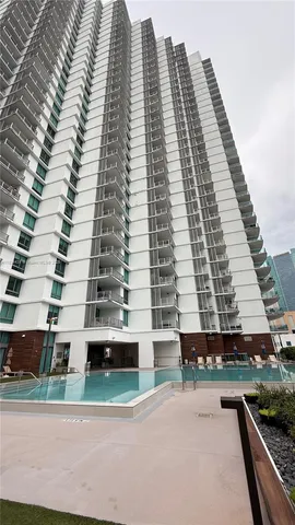 a gym with lots of table and chairs