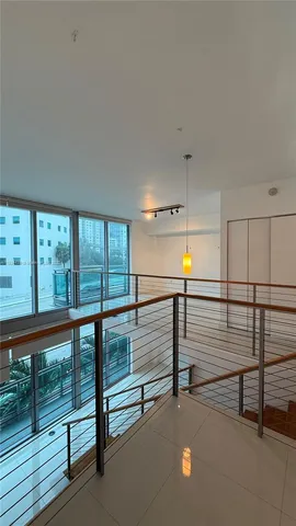 a bathroom with a toilet a sink and bathtub