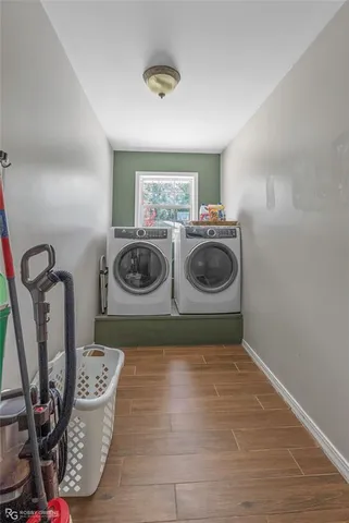 a utility room with dryer and washer