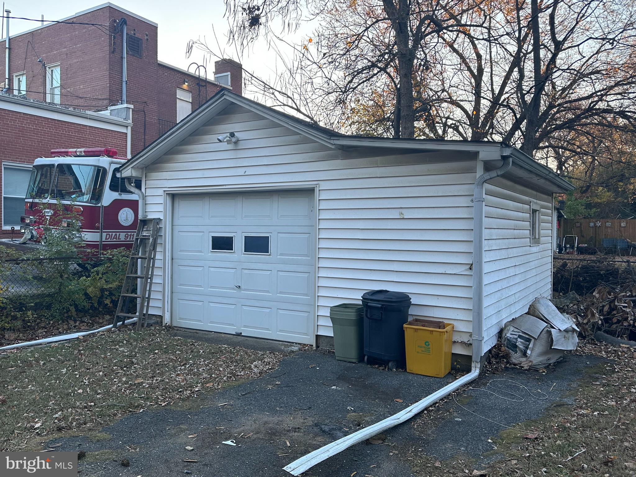 4719 Rittenhouse Street Riverdale, MD 20737 - Photo 15 of 15 a front view of a house with garage