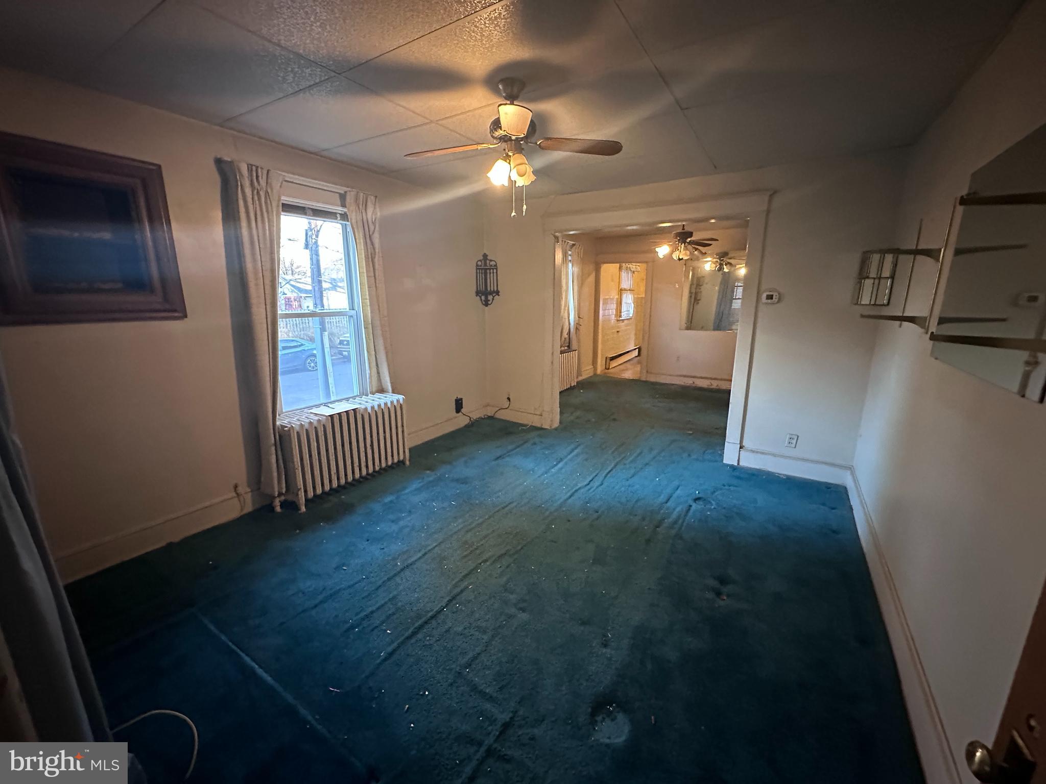 4719 Rittenhouse Street Riverdale, MD 20737 - Photo 10 of 15 wooden floor in an empty room with a window