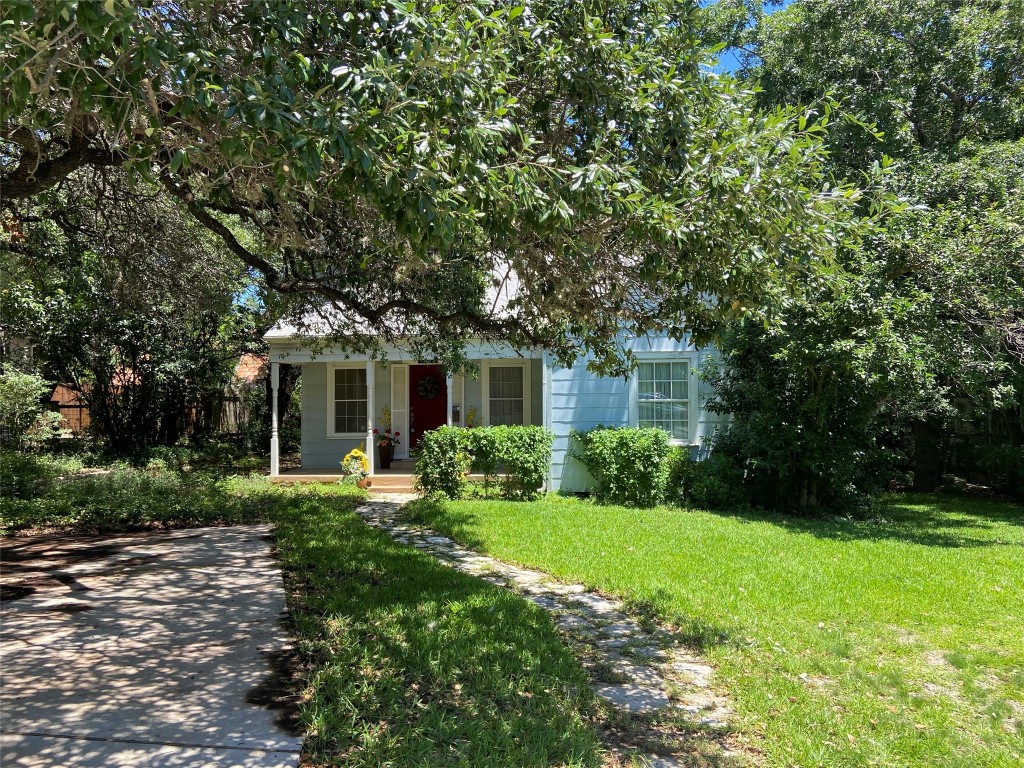 2710 Enfield Road Austin, TX 78703 - Photo 1 of 1 a front view of a house with a yard and green space