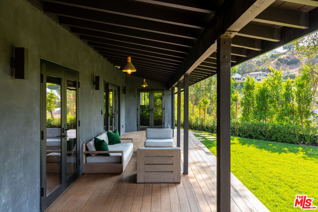16666 Oldham Street Encino, CA 91436 - Photo 32 of 43 a view of living room with furniture and garden
