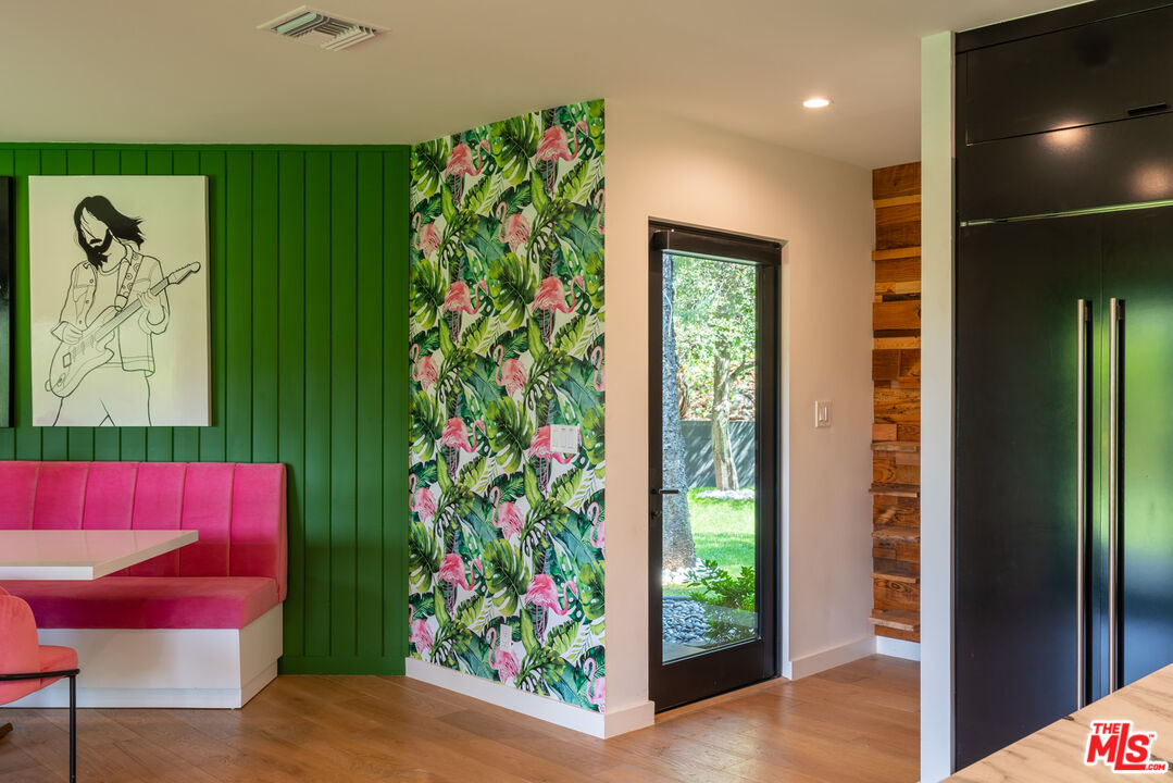 16666 Oldham Street Encino, CA 91436 - Photo 5 of 43 a room with furniture and a potted plant