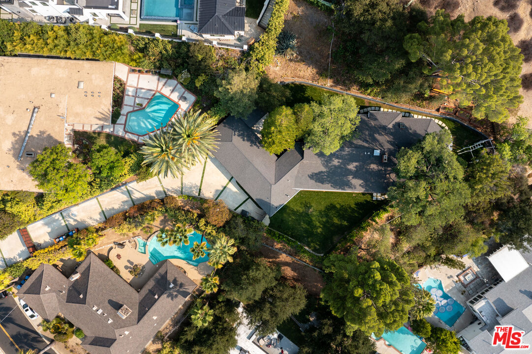 16666 Oldham Street Encino, CA 91436 - Photo 42 of 43 an aerial view of a house with a yard