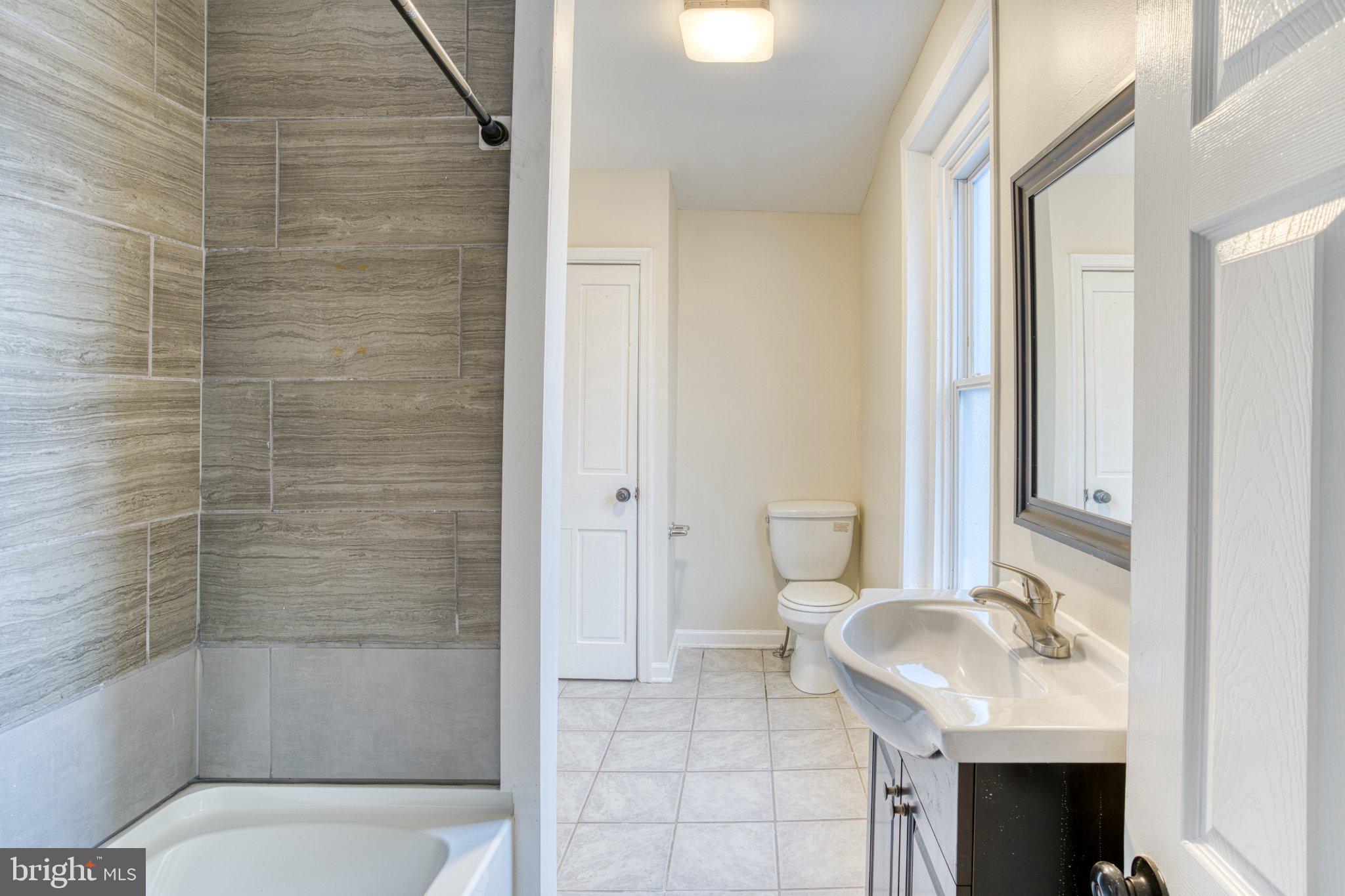 75 Ellis Street Haddonfield, NJ 08033 - Photo 19 of 22 Modern bathroom with sleek finishes.