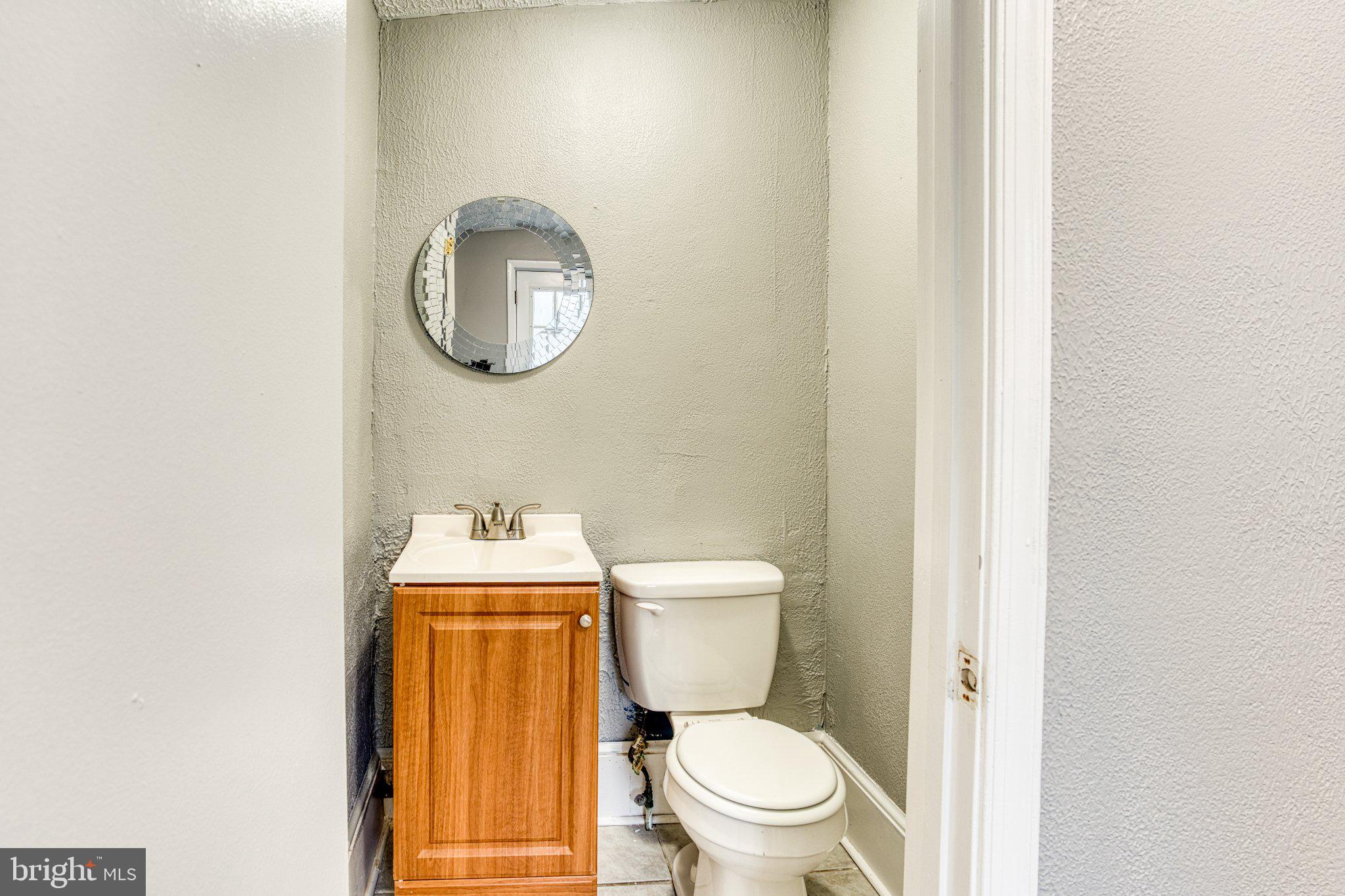 75 Ellis Street Haddonfield, NJ 08033 - Photo 9 of 22 Chic half-bath with modern touches.