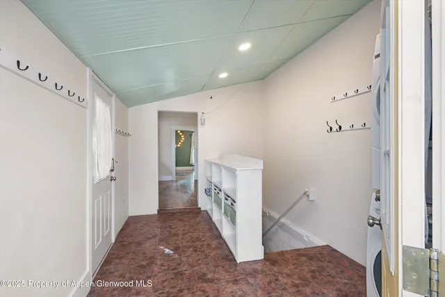 a view of a hallway with a white stove