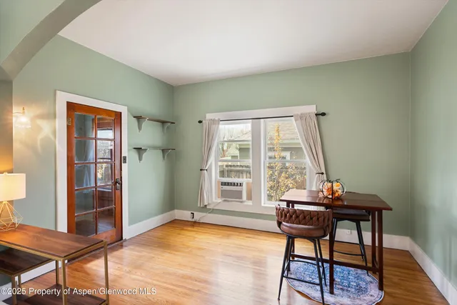 a workspace with furniture and a window