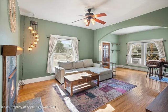 a living room with furniture and a window