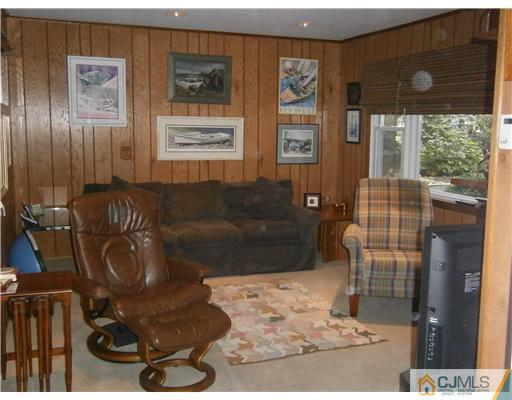 42 Clive Hills Road Edison, NJ 08820 - Photo 10 of 17 a living room with furniture