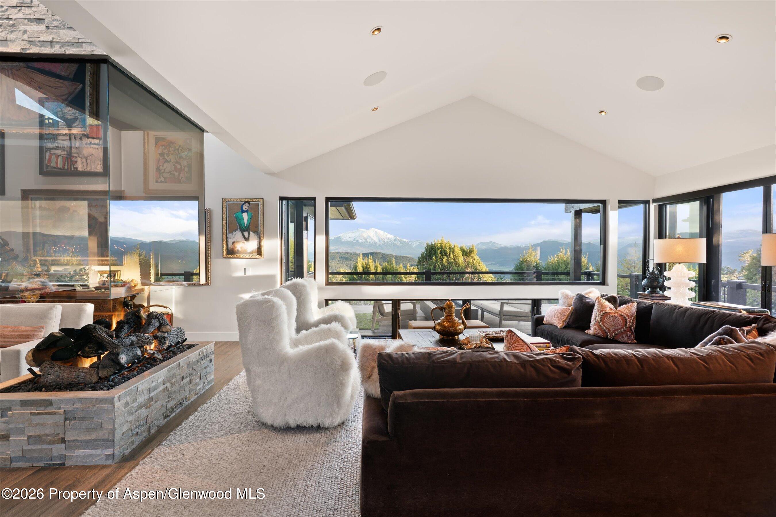 258 Monarch Road Glenwood Springs, CO 81601 - Photo 14 of 73 a living room with furniture and a large window