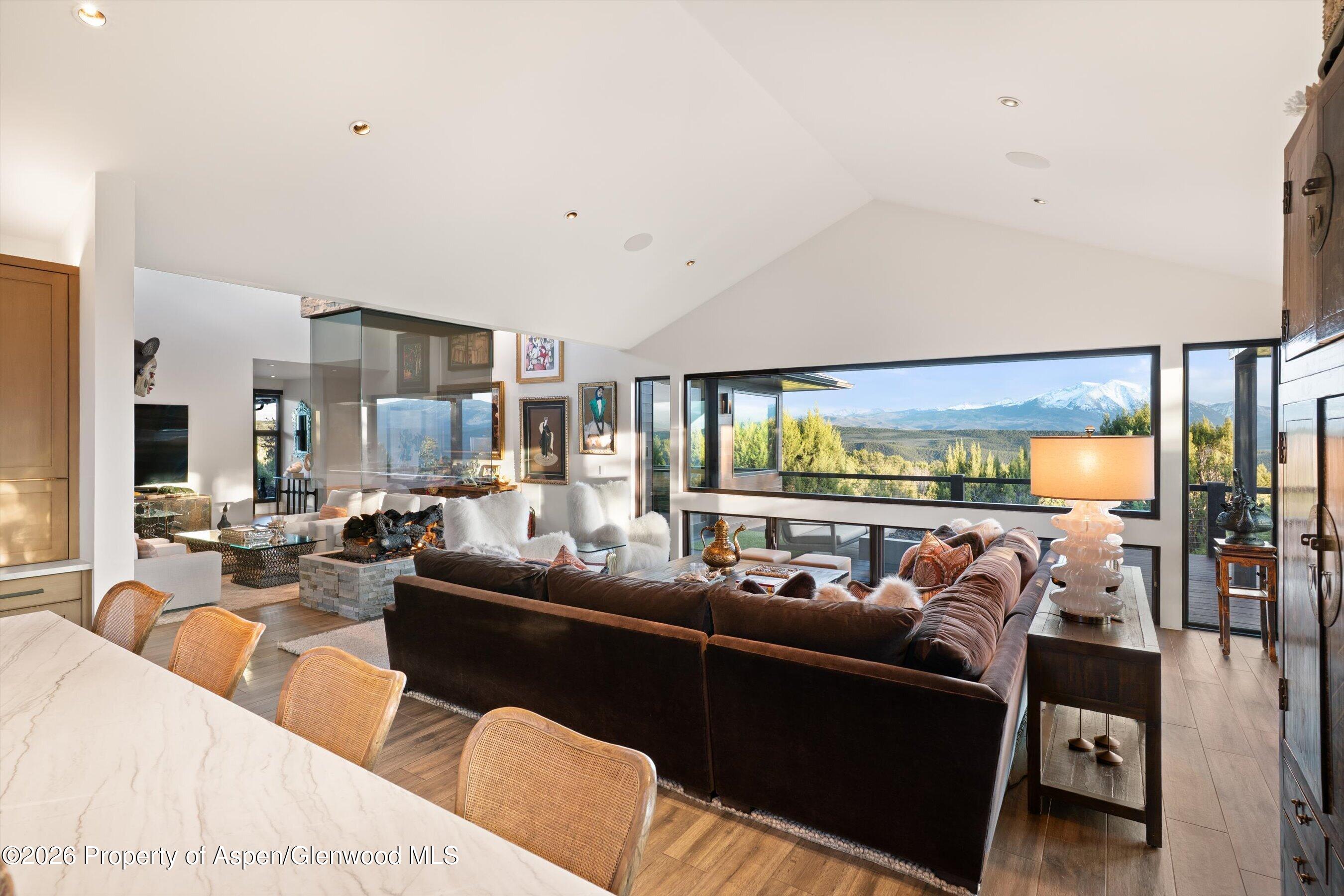 258 Monarch Road Glenwood Springs, CO 81601 - Photo 15 of 73 a living room with furniture and a large window