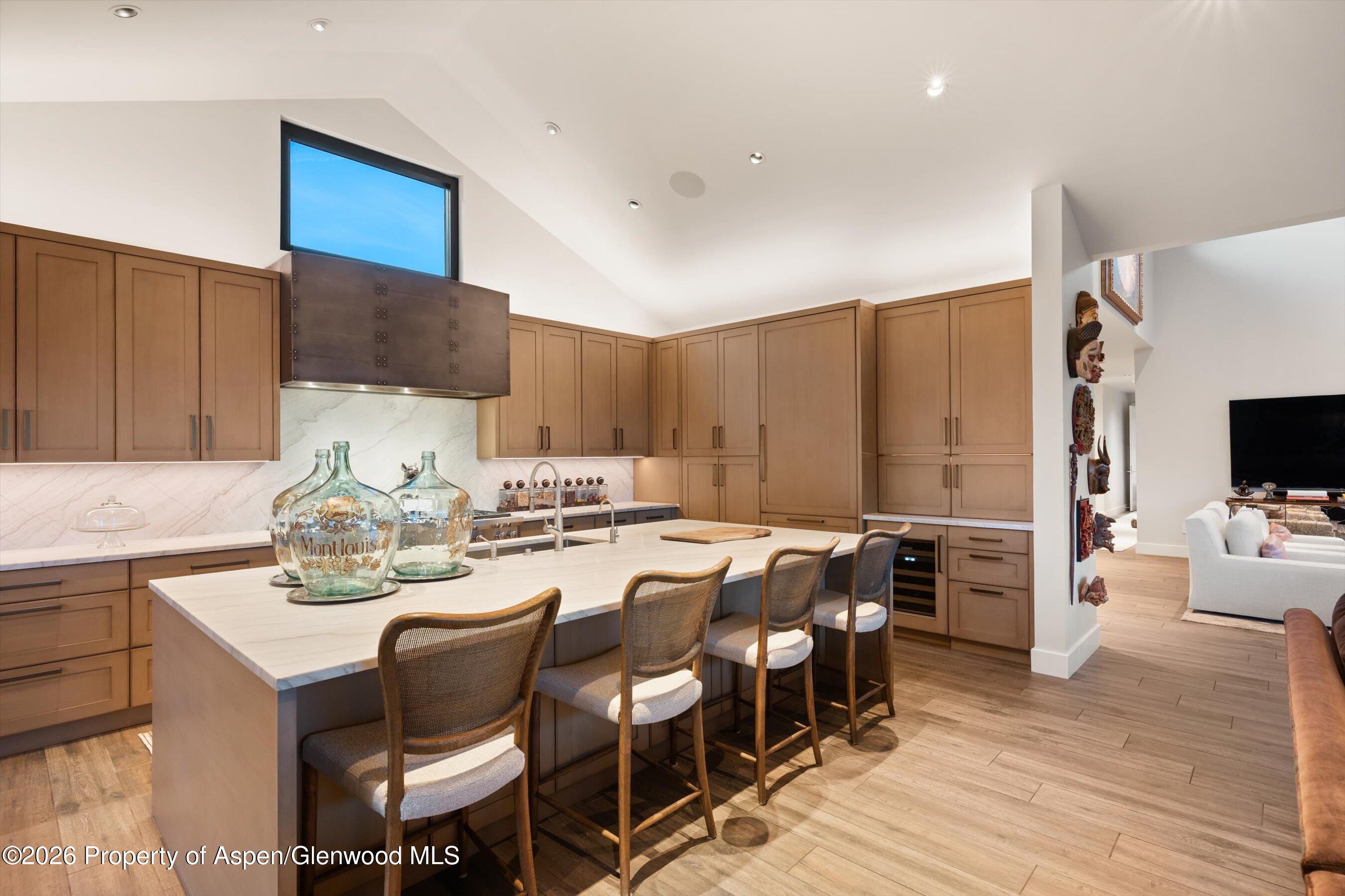 258 Monarch Road Glenwood Springs, CO 81601 - Photo 20 of 73 a kitchen with stainless steel appliances a dining table and chairs