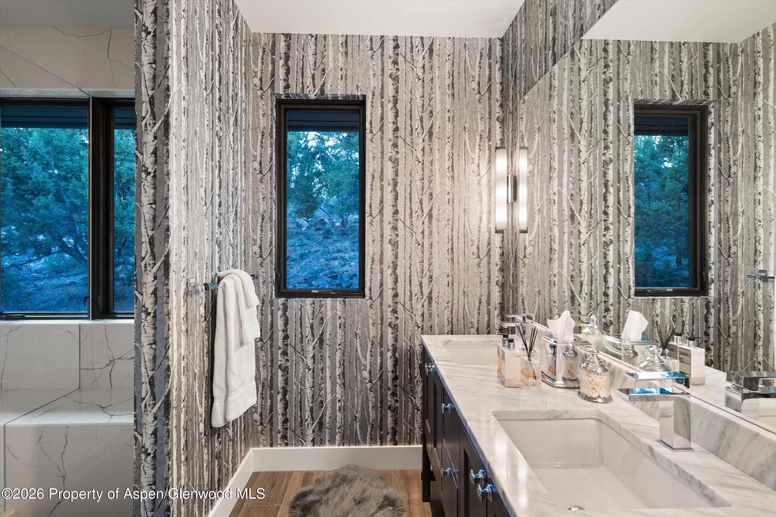 258 Monarch Road Glenwood Springs, CO 81601 - Photo 29 of 73 a bathroom with a sink and a mirror