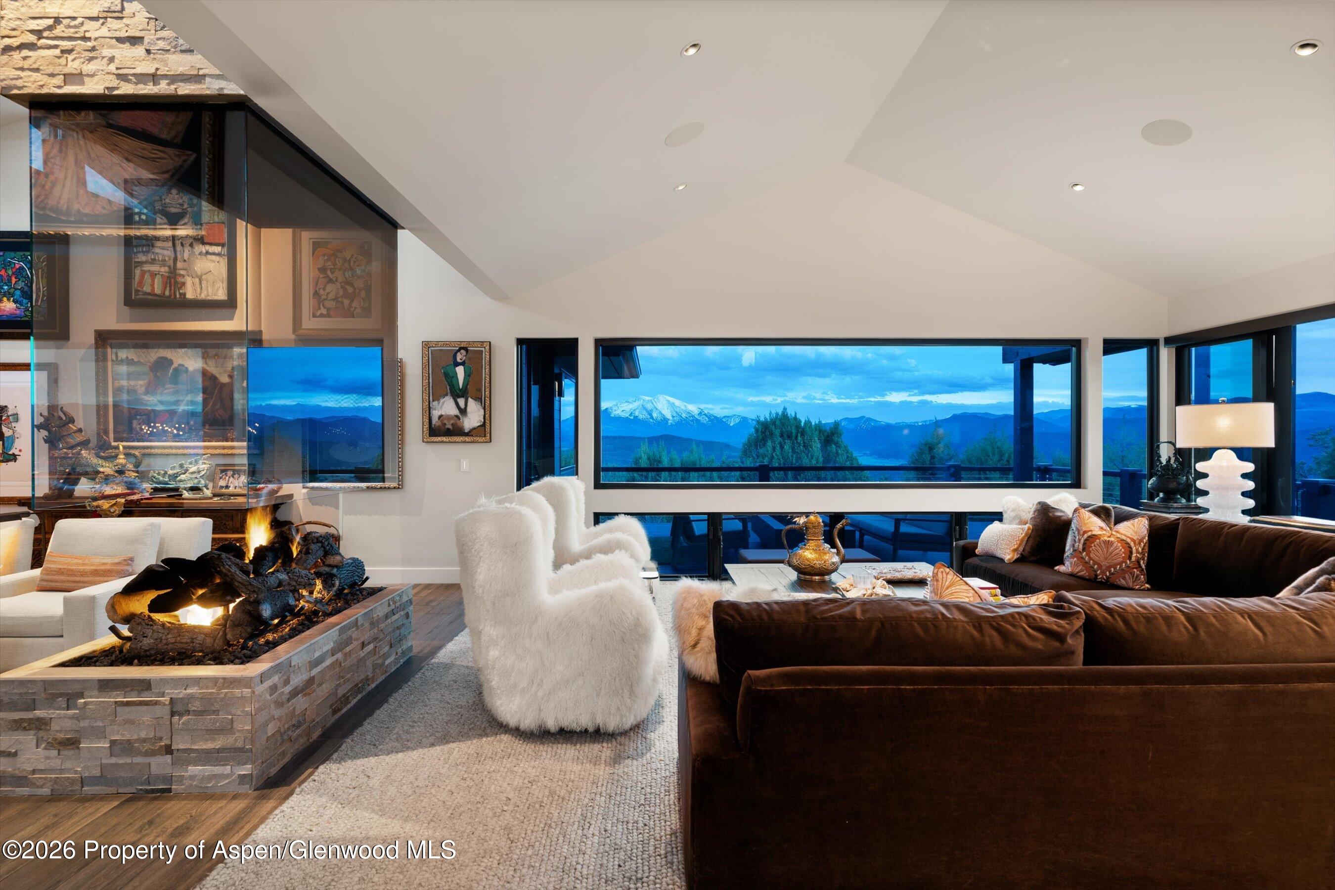 258 Monarch Road Glenwood Springs, CO 81601 - Photo 3 of 73 a living room with furniture and a rug