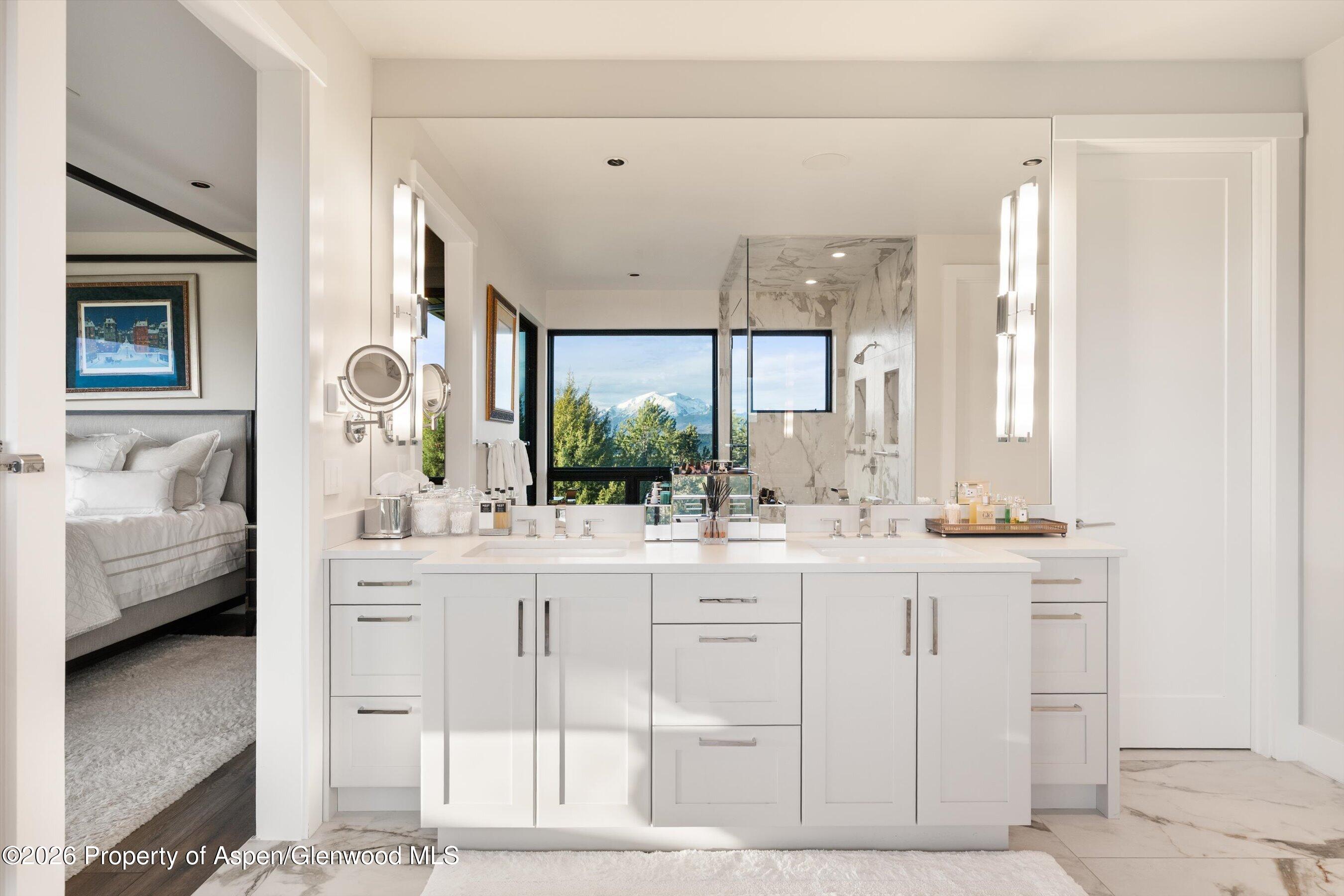 258 Monarch Road Glenwood Springs, CO 81601 - Photo 31 of 73 a kitchen with granite countertop a sink and cabinets