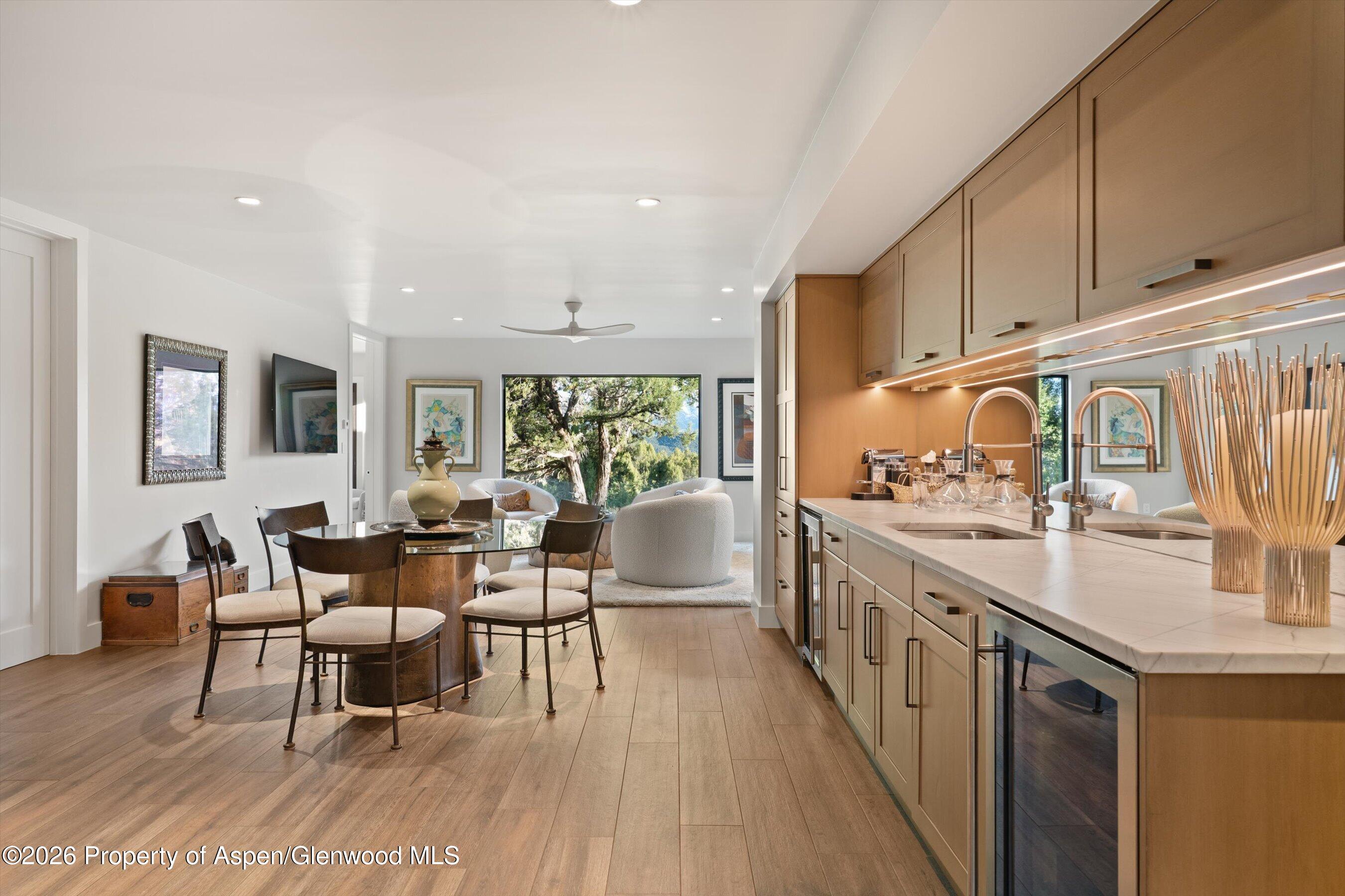258 Monarch Road Glenwood Springs, CO 81601 - Photo 37 of 73 a living room with stainless steel appliances granite countertop furniture wooden floor and a sink