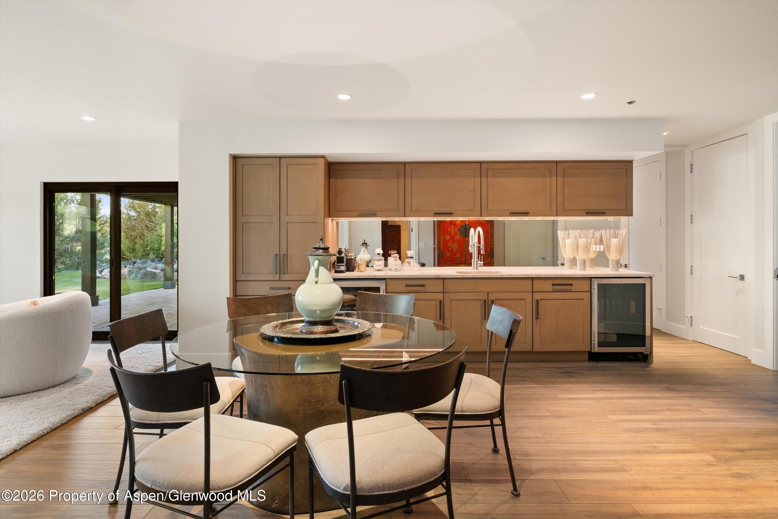 258 Monarch Road Glenwood Springs, CO 81601 - Photo 38 of 73 a dining room with furniture and wooden floor