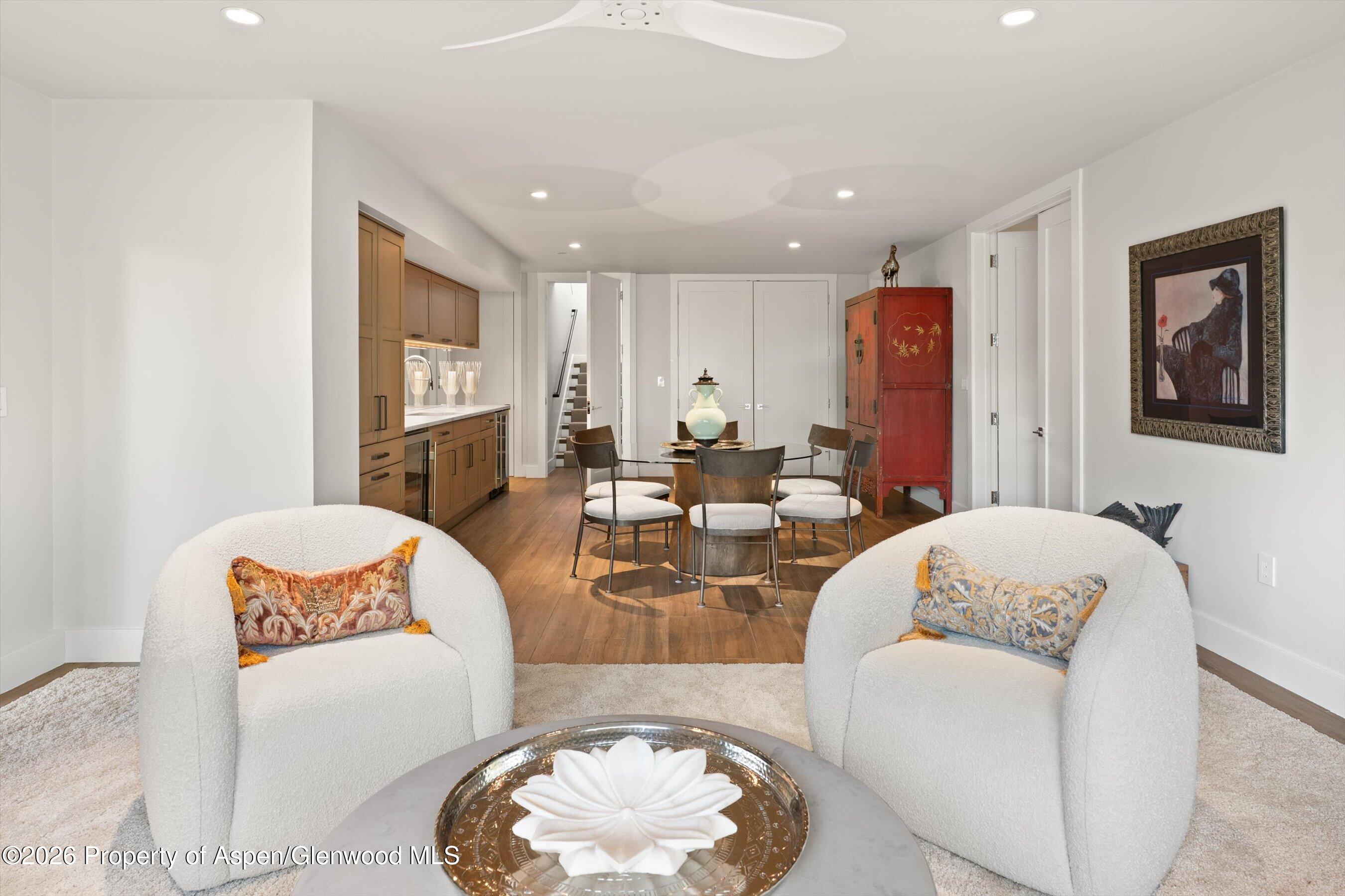 258 Monarch Road Glenwood Springs, CO 81601 - Photo 41 of 73 a living room with furniture and a wooden floor