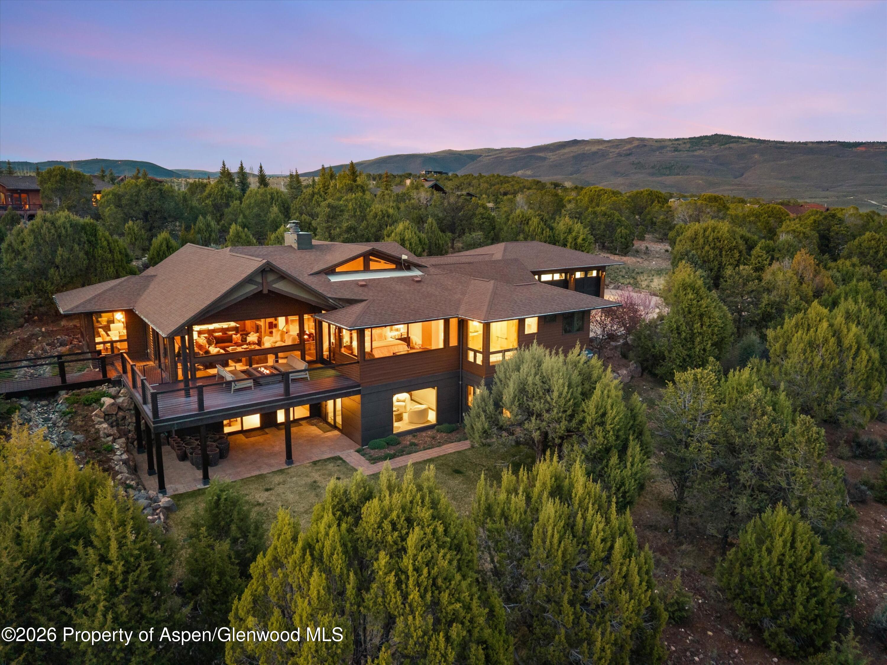 258 Monarch Road Glenwood Springs, CO 81601 - Photo 59 of 73 a view of a terrace with a table and chairs