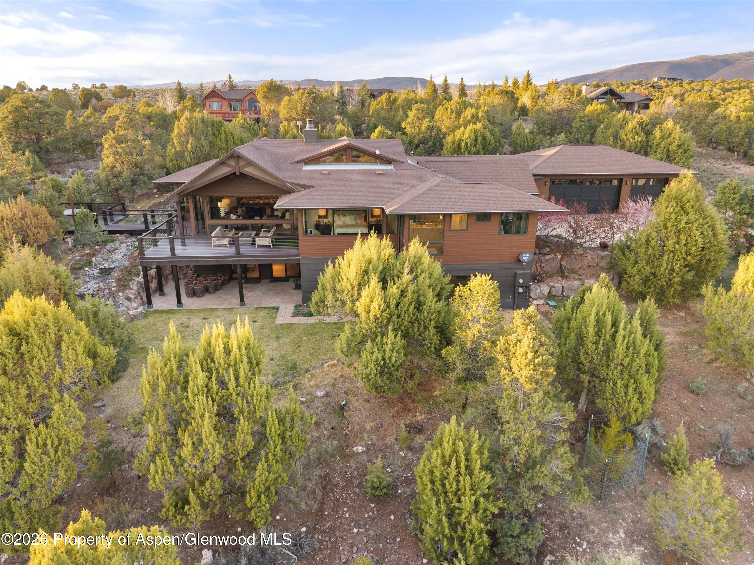 258 Monarch Road Glenwood Springs, CO 81601 - Photo 60 of 73 an aerial view of a house with a garden and lake view