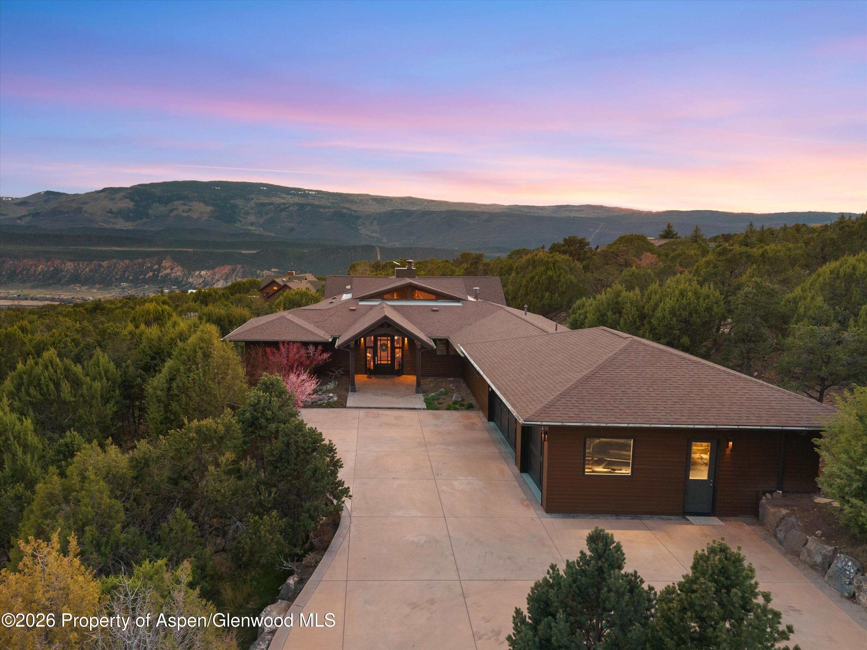 258 Monarch Road Glenwood Springs, CO 81601 - Photo 62 of 73 a view of a town with mountains in the background