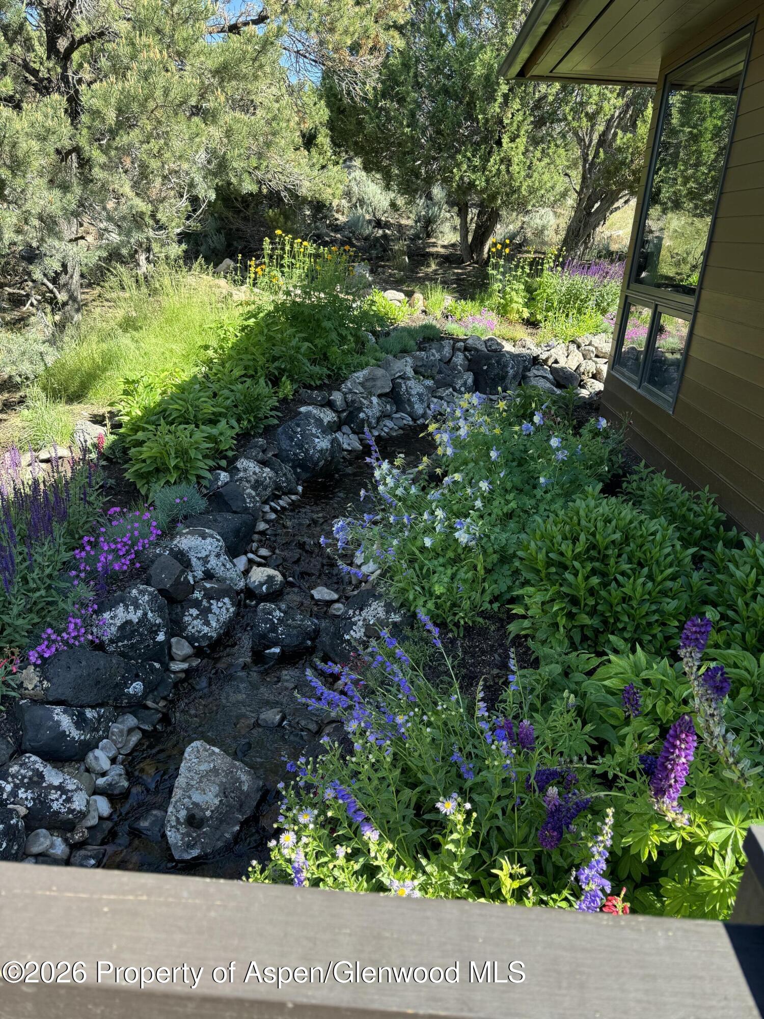 258 Monarch Road Glenwood Springs, CO 81601 - Photo 68 of 73 a view of a garden with a flower garden