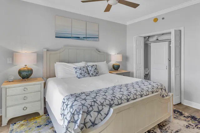 a bedroom with a large bed and a window