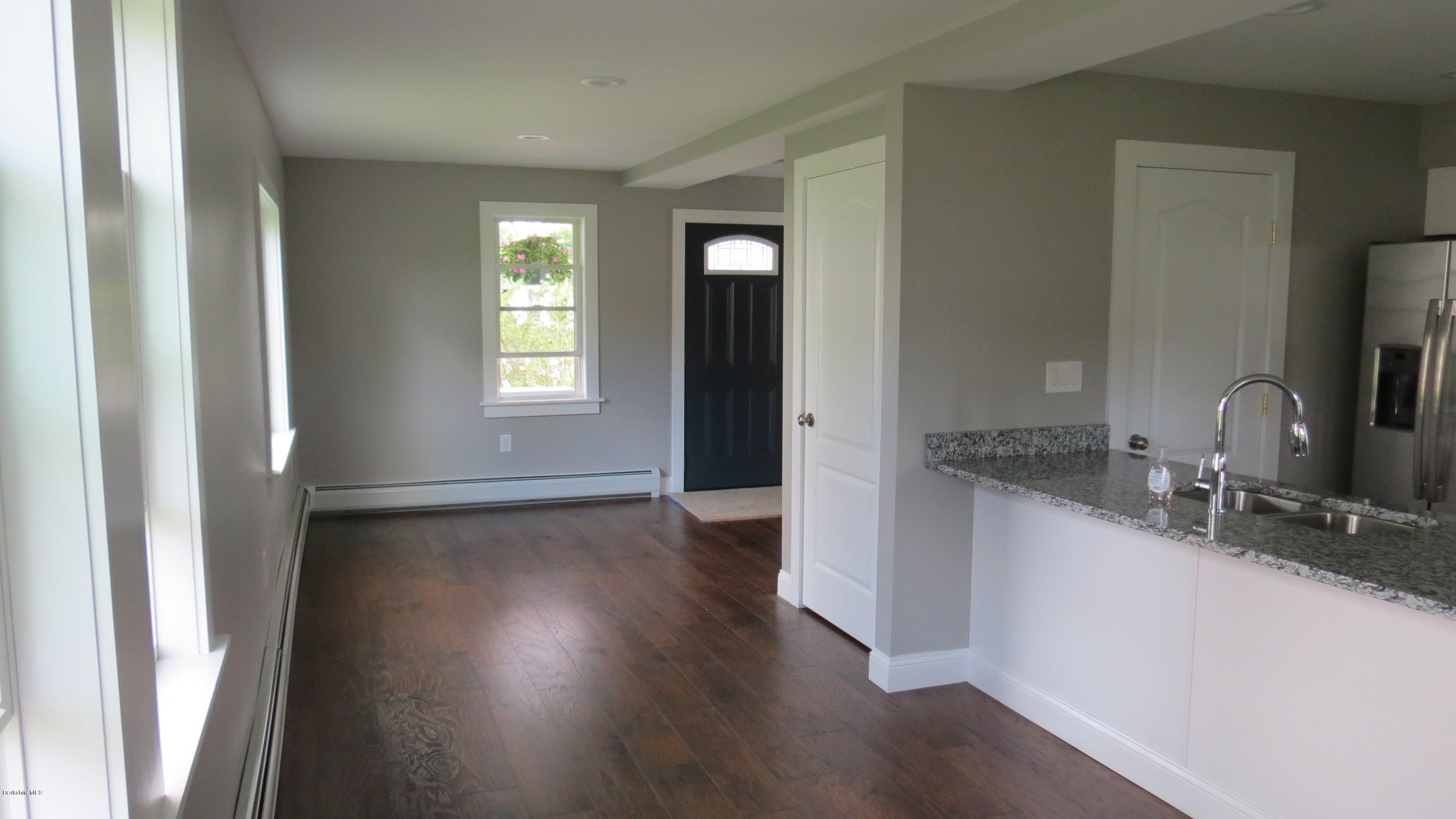 64 Valley Street Adams, MA 01220 - Photo 9 of 41 Kitchen into den-laminate flooring